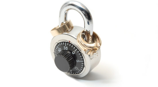 Only One Person Wants a Divorce Image of Lock With Wedding Rings On It